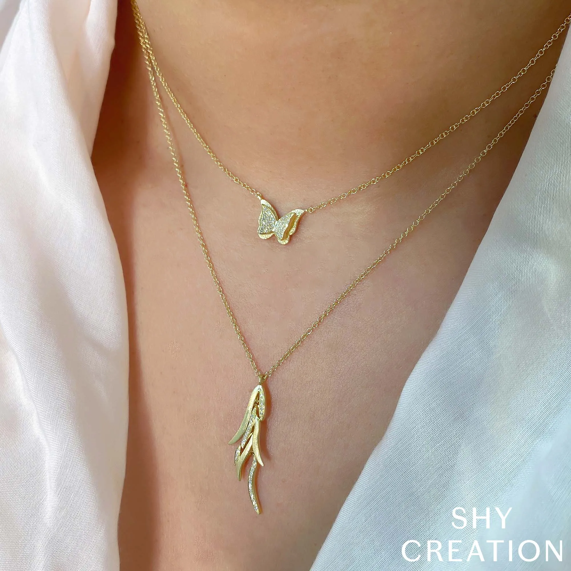 0.06CT DIAMOND BUTTERFLY NECKLACE