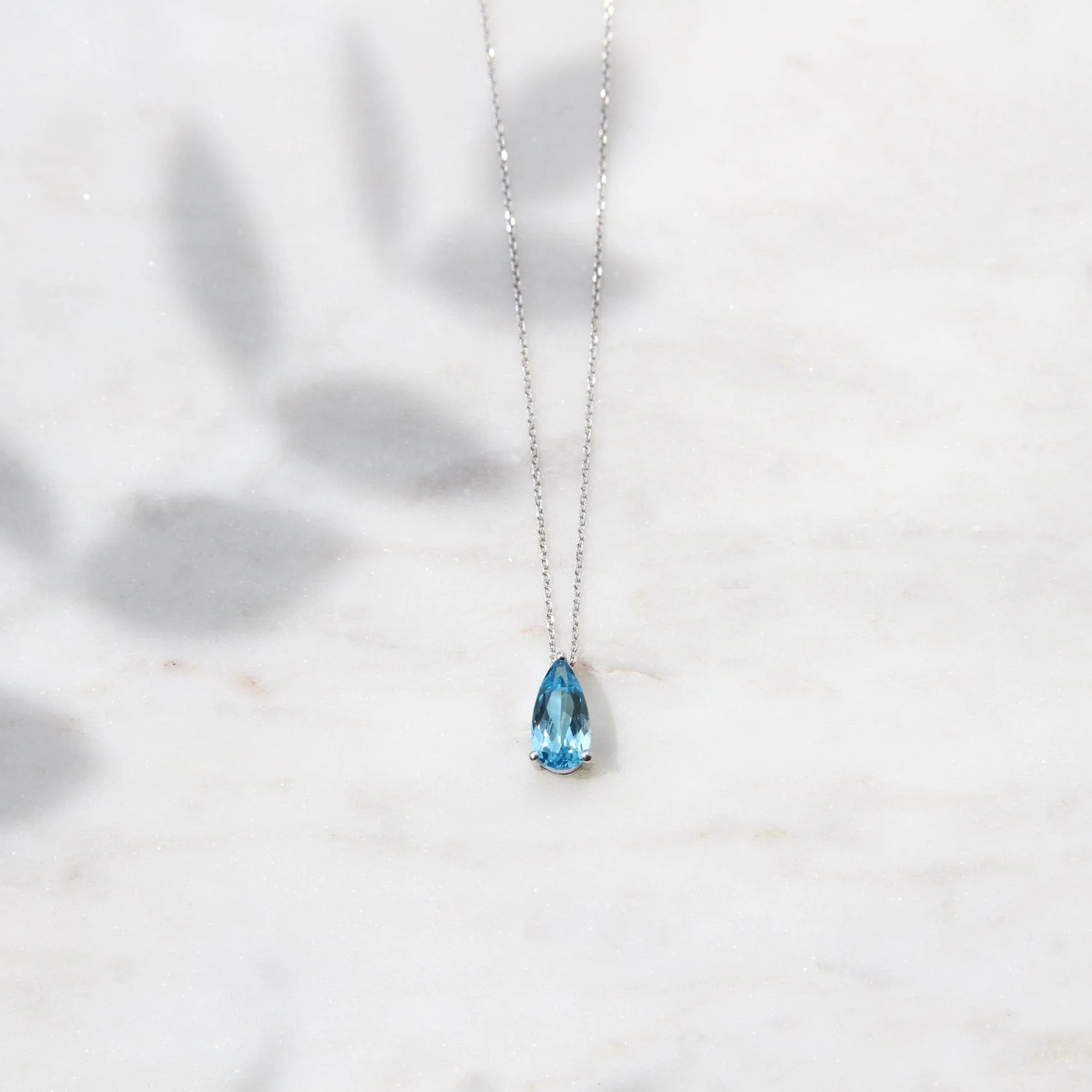14k White Gold Pear Shaped Swiss Blue Topaz
