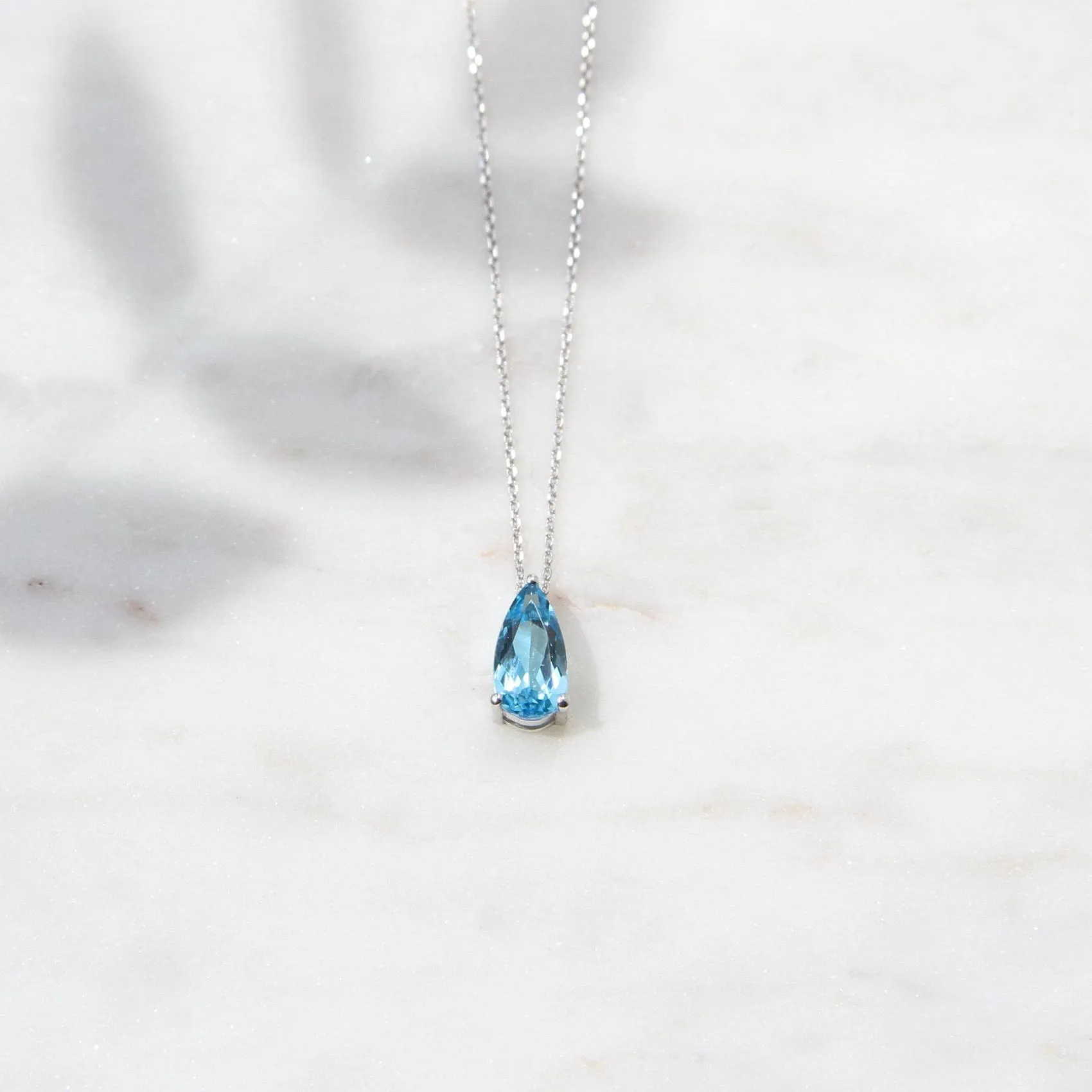 14k White Gold Pear Shaped Swiss Blue Topaz