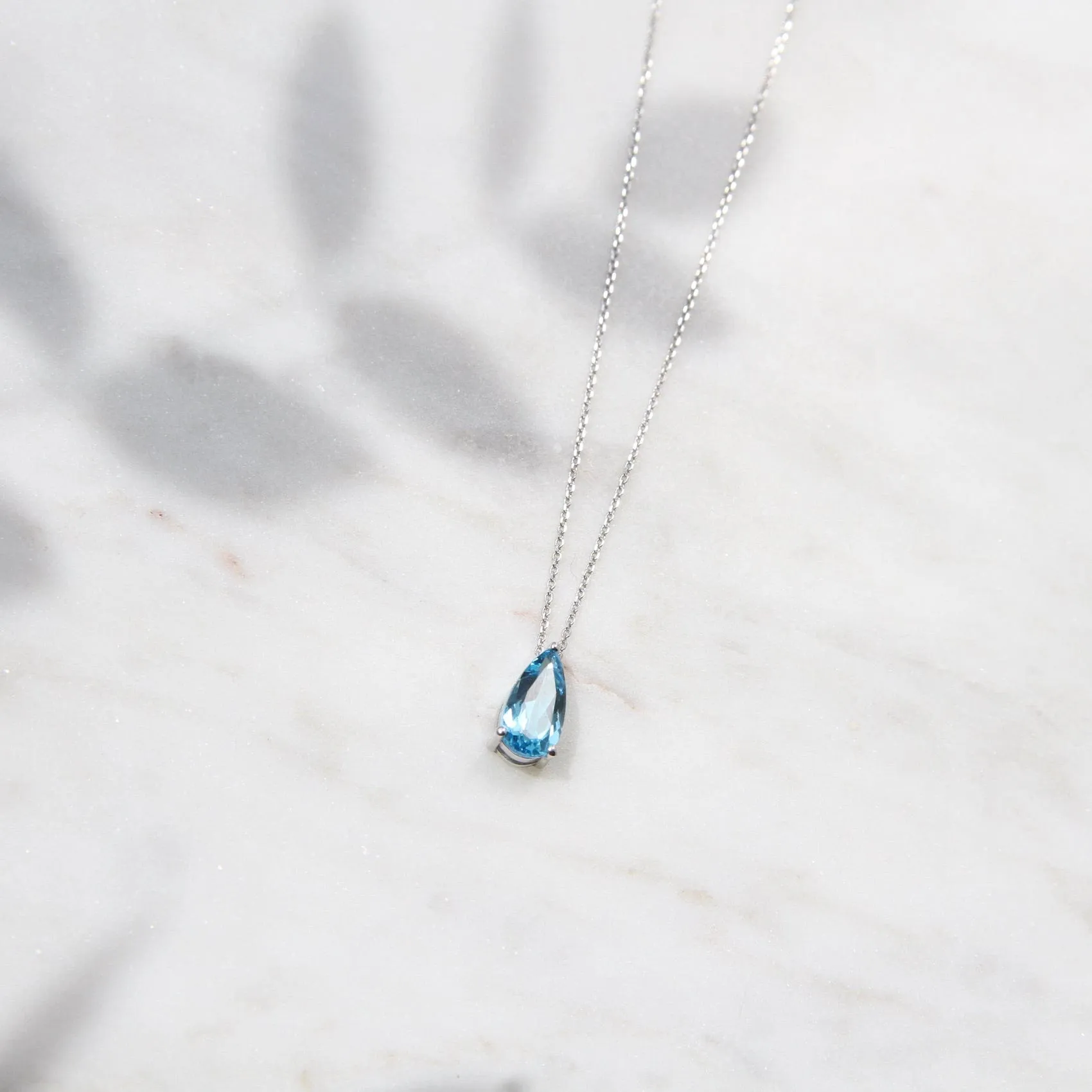 14k White Gold Pear Shaped Swiss Blue Topaz
