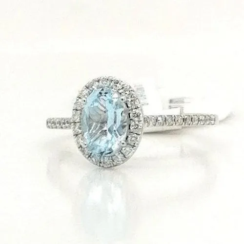 18ct White Gold Oval Blue Topaz & Diamond ring