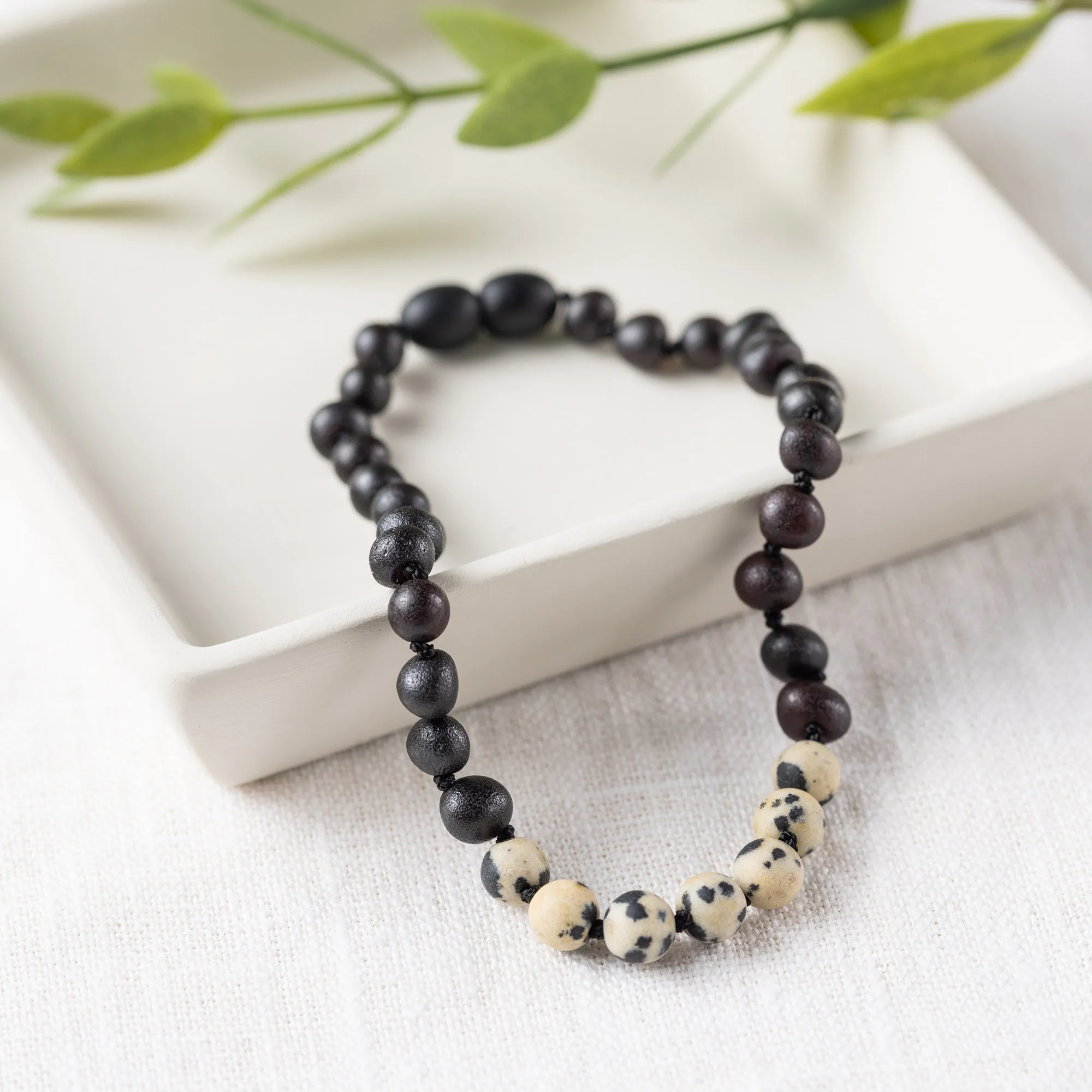 Adults | Dalmatian Jasper   Raw Cherry Amber Anklet