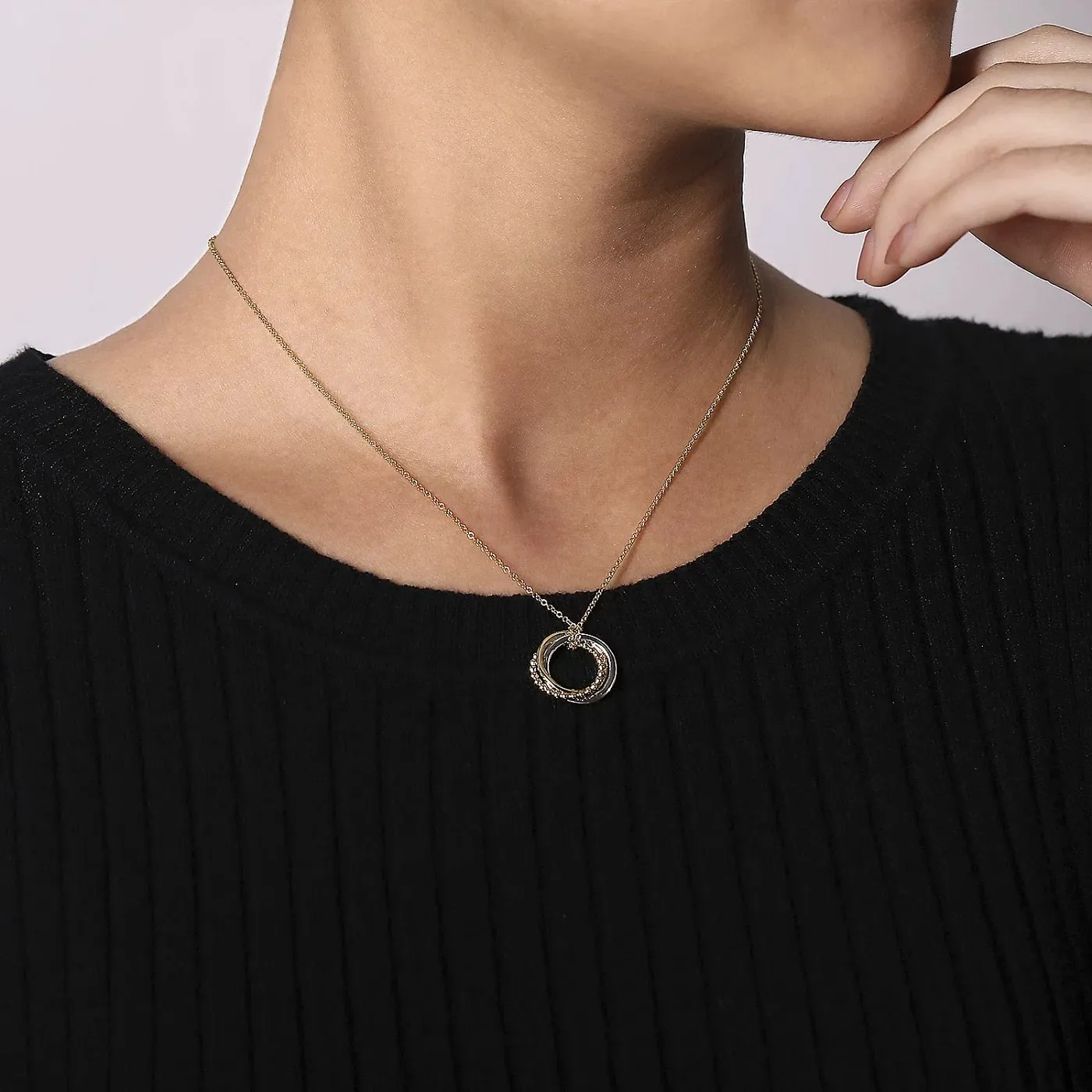 Bujukan Yellow and White Gold Diamond Interlocking Circle Pendant Necklace, 0.26 cttw