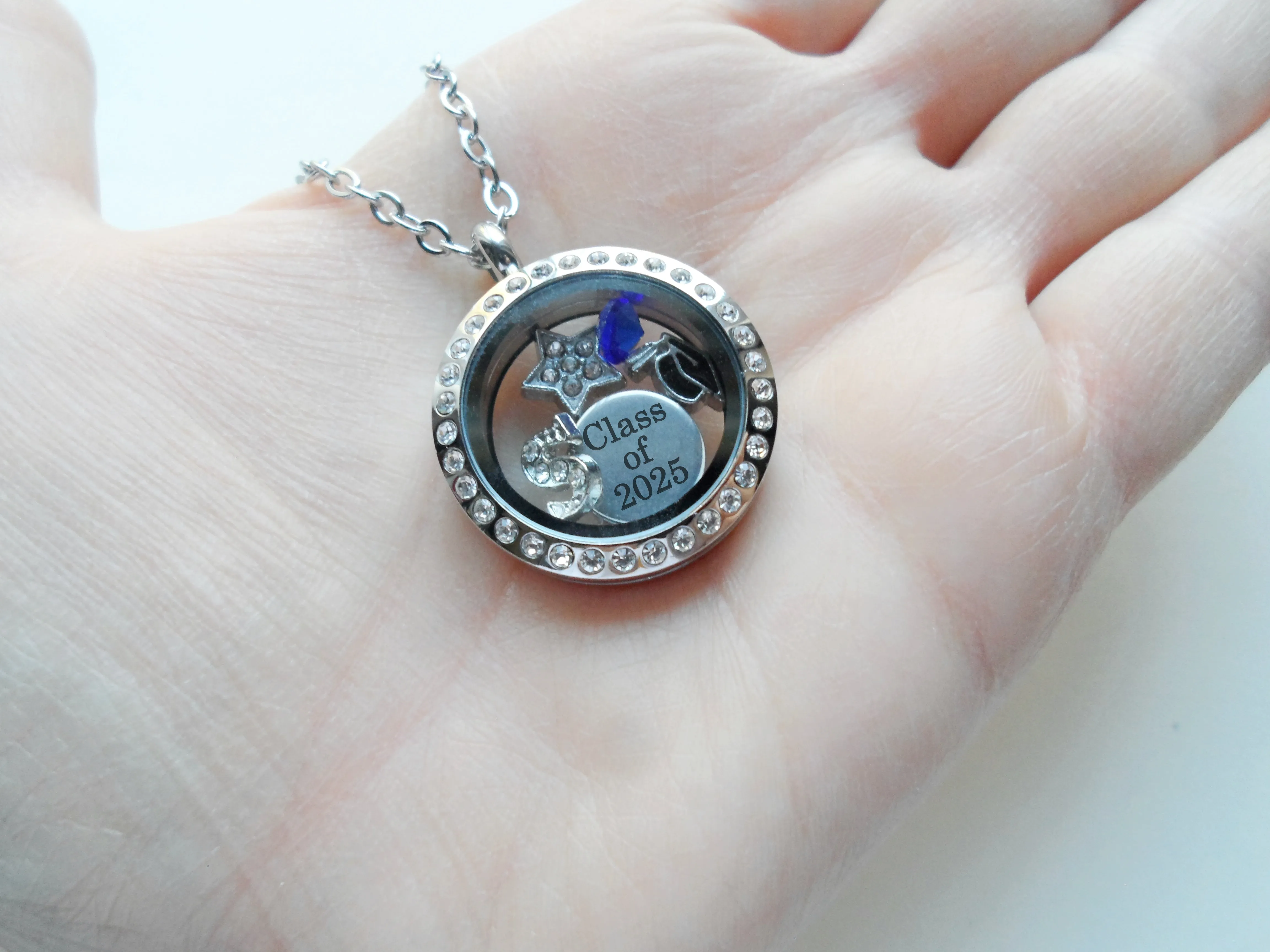 Class of 2025 Graduate Locket Necklace with Graduate Cap, "Class of 2025" Disc Charm, and Custom Letter & Birthstone - by Jewelry Everyday