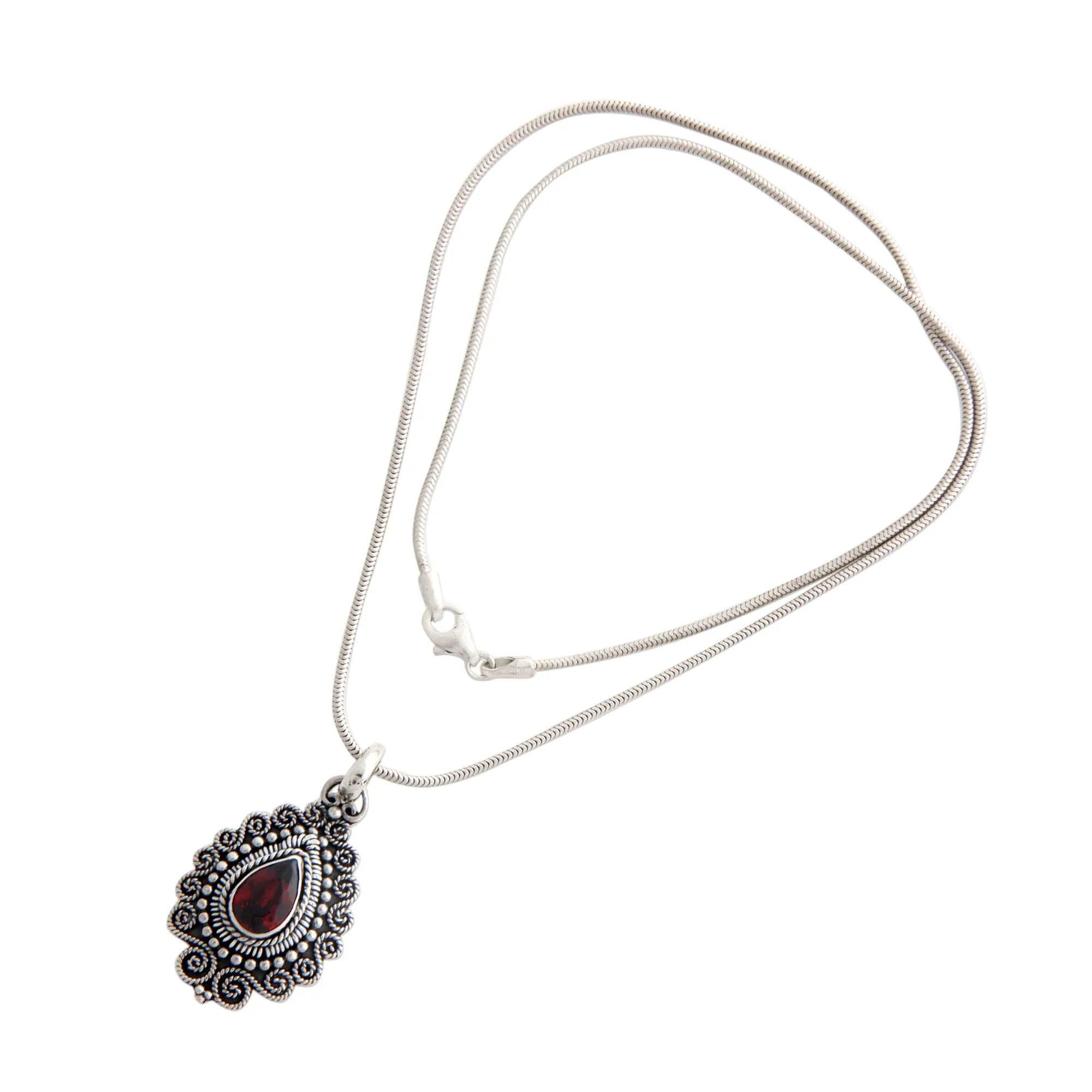 Handcrafted Sterling Silver and Garnet Pendant Necklace - Queen of Bali | NOVICA
